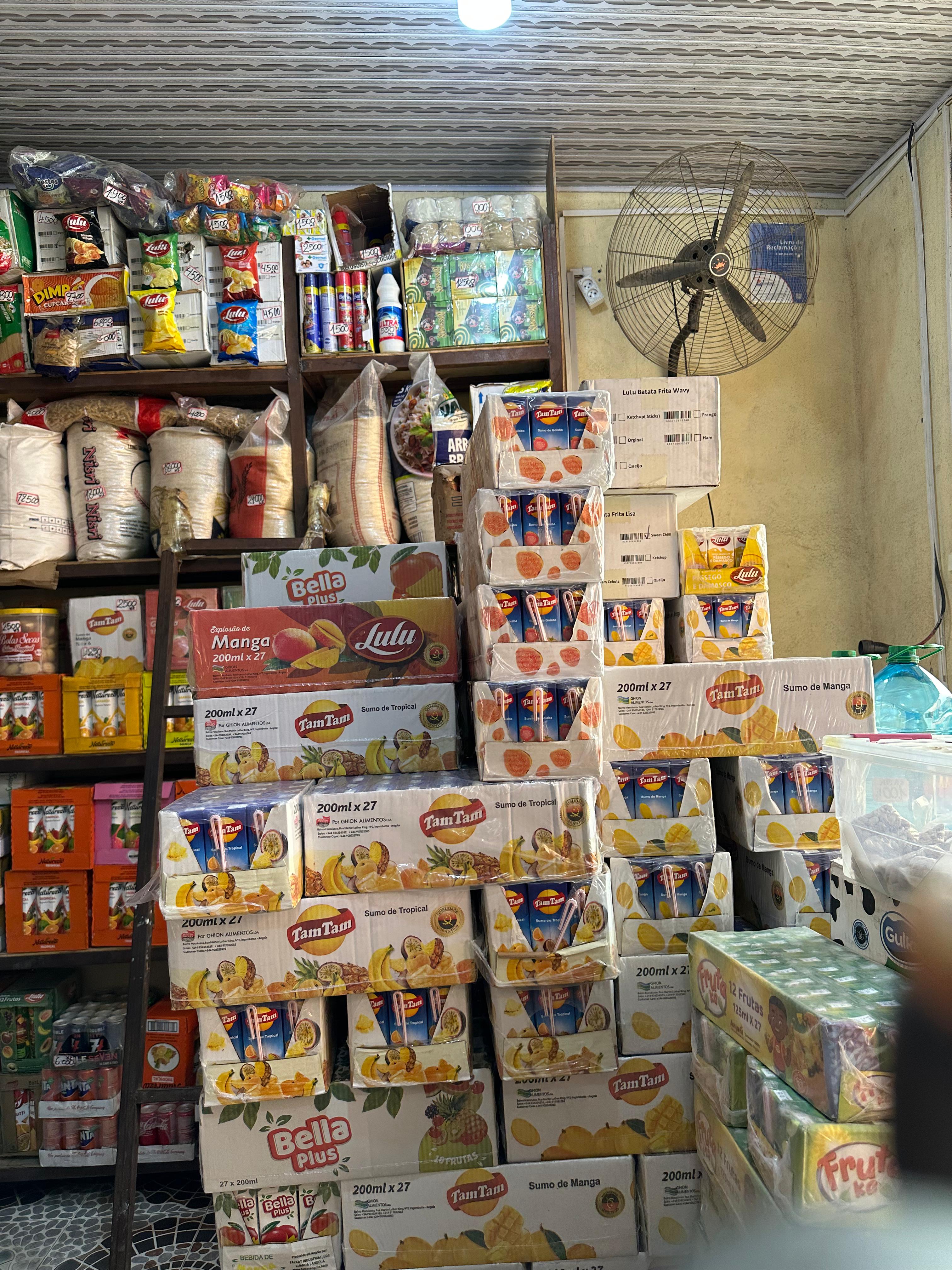 Glass-top coffee table with wooden legs and hidden storage compartment